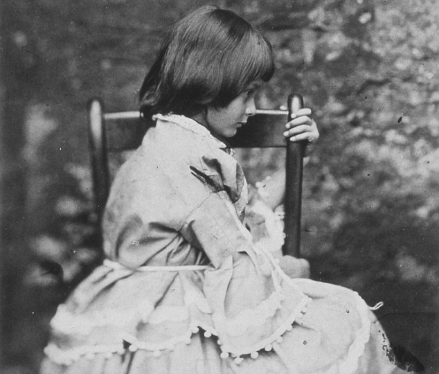 Young girl: Alice Liddell (pictured) was photographed many times by Carroll. Pictured above in 1858, she was the daughter of family friend Henry George Liddell and the inspiration for Alice in Wonderland