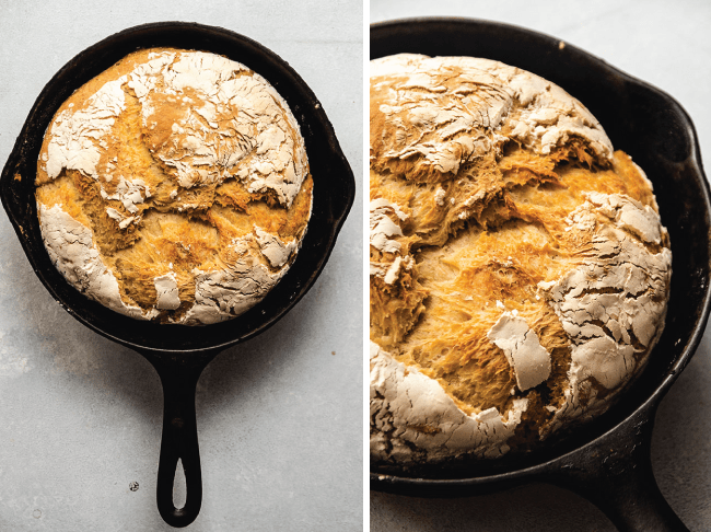 loaf of crusty bread in a black cast iron skiller